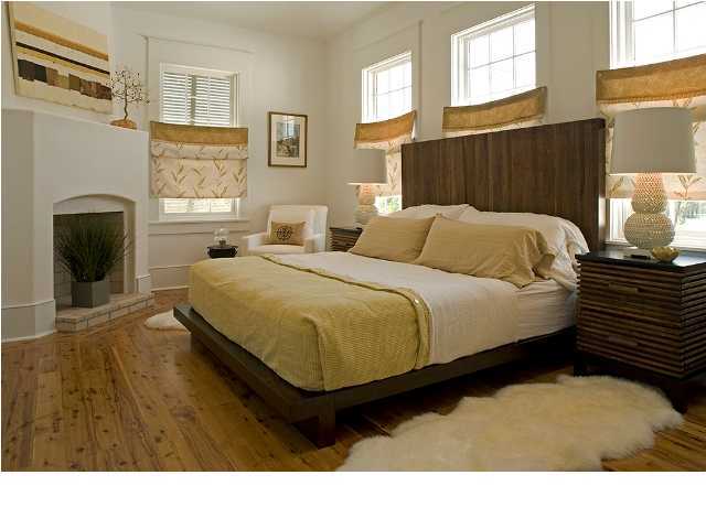92 Hogpenny Alley Inlet Beach Inlet Beach, FL 32461 - Photo 4 of 12 a bedroom with a bed and wooden floor