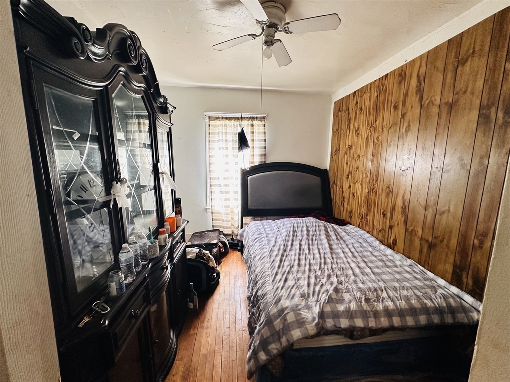 32 Ames Street Worcester, MA 01604 - Photo 14 of 21 a bedroom with a bed and a window