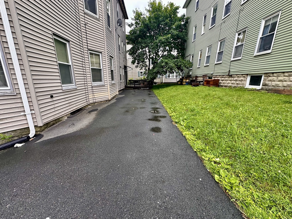 32 Ames Street Worcester, MA 01604 - Photo 2 of 21 a view of a back yard of the house