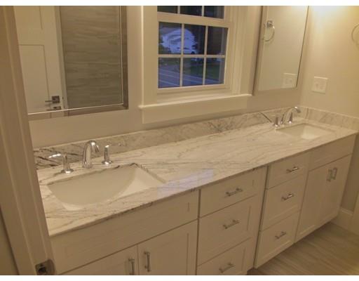 3 Hutchinson Road Lexington, MA 02421 - Photo 21 of 36 a bathroom with a sink and a mirror
