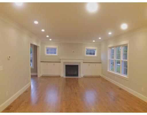 3 Hutchinson Road Lexington, MA 02421 - Photo 5 of 36 a view of an empty room with wooden floor and a window