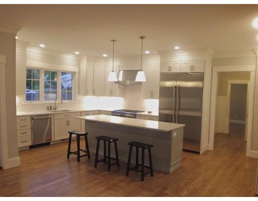 3 Hutchinson Road Lexington, MA 02421 - Photo 7 of 36 a kitchen with kitchen island a sink stove and refrigerator