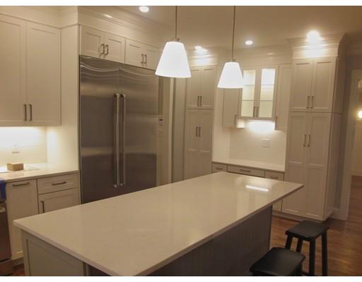 3 Hutchinson Road Lexington, MA 02421 - Photo 8 of 36 a kitchen with a table and chairs