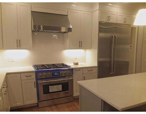 3 Hutchinson Road Lexington, MA 02421 - Photo 9 of 36 a kitchen with a stove and a refrigerator