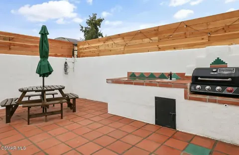 a table with a vase and a vase on it