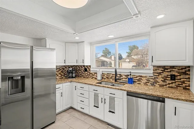 $610,000 | 14894 East Warren Avenue, Aurora, CO 80014