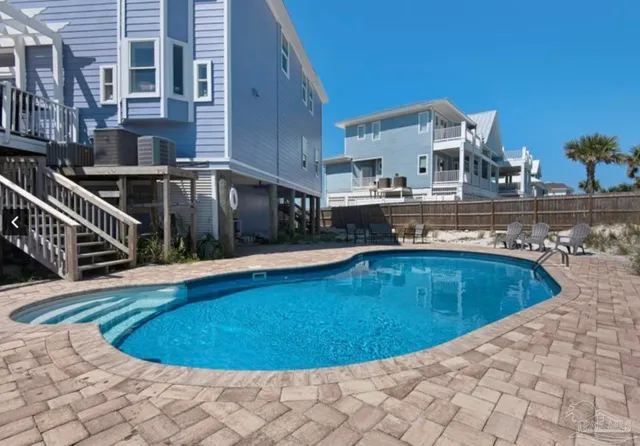 a view of a chairs on the deck