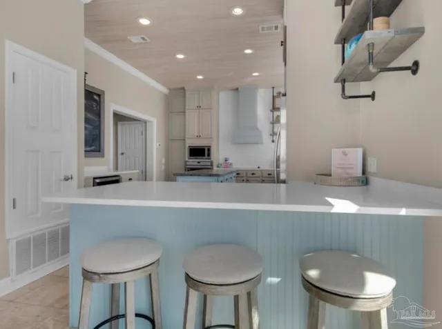 a bathroom with a toilet a sink and a mirror