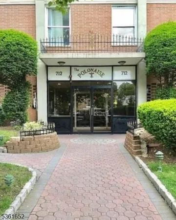 a view of a building with a entrance gate