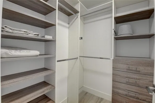 a storage room with washer and dryer