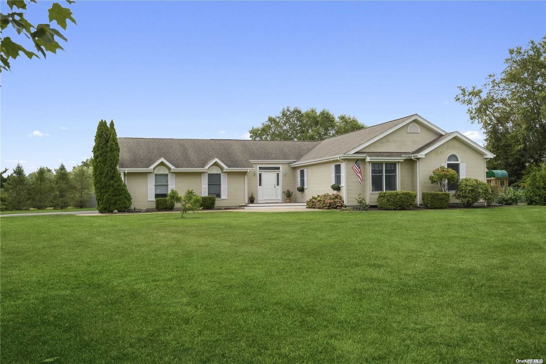 250 Farmveu Road Mattituck, NY 11952 - Photo 1 of 1 a view of a house with a big yard