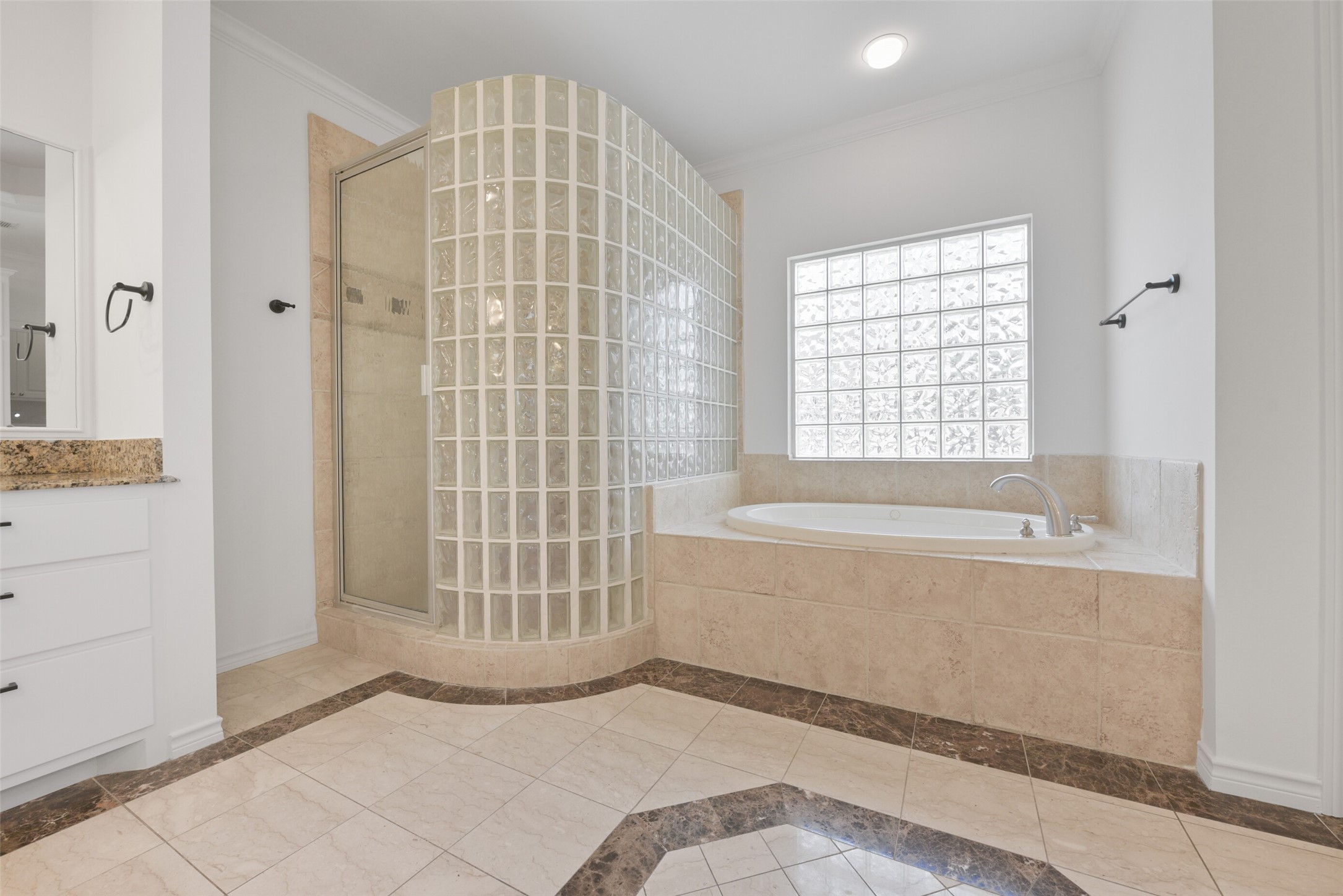 3724 Wroxton Road Houston, TX 77005 - Photo 32 of 40 Huge primary bathroom with two vanities, walk-in shower, and jacuzzi tub.