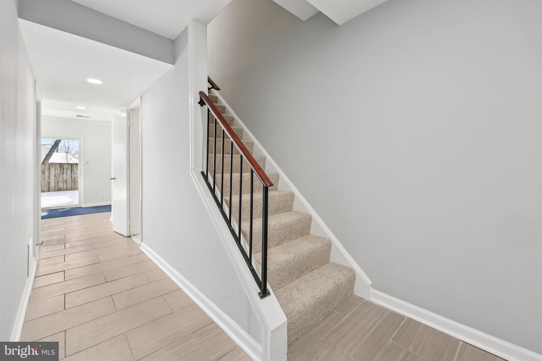 500 Giles Place Sterling, VA 20164 - Photo 11 of 41 a view of a hallway with staircase