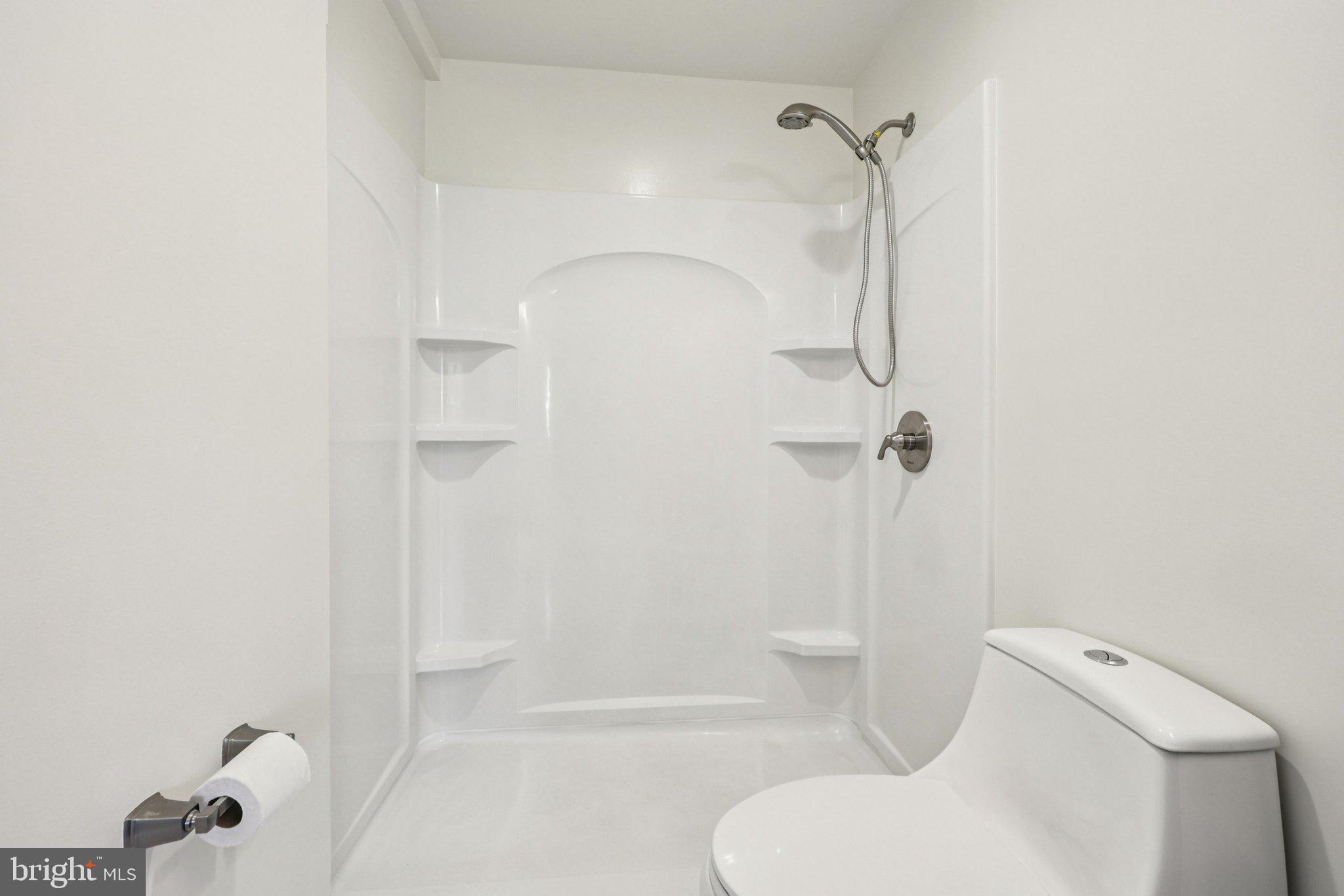 500 Giles Place Sterling, VA 20164 - Photo 27 of 41 a bathroom with a toilet and shower