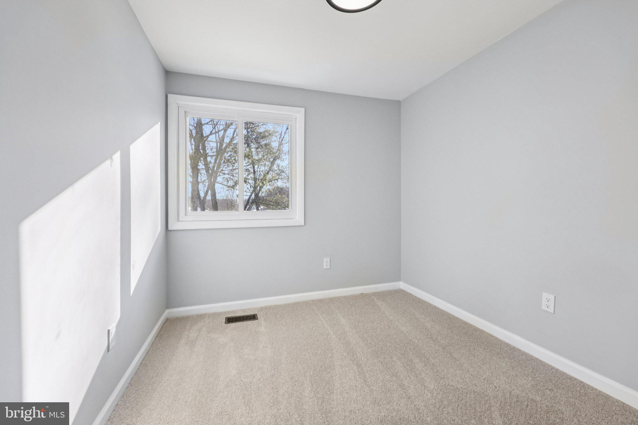500 Giles Place Sterling, VA 20164 - Photo 30 of 41 an empty room with a window