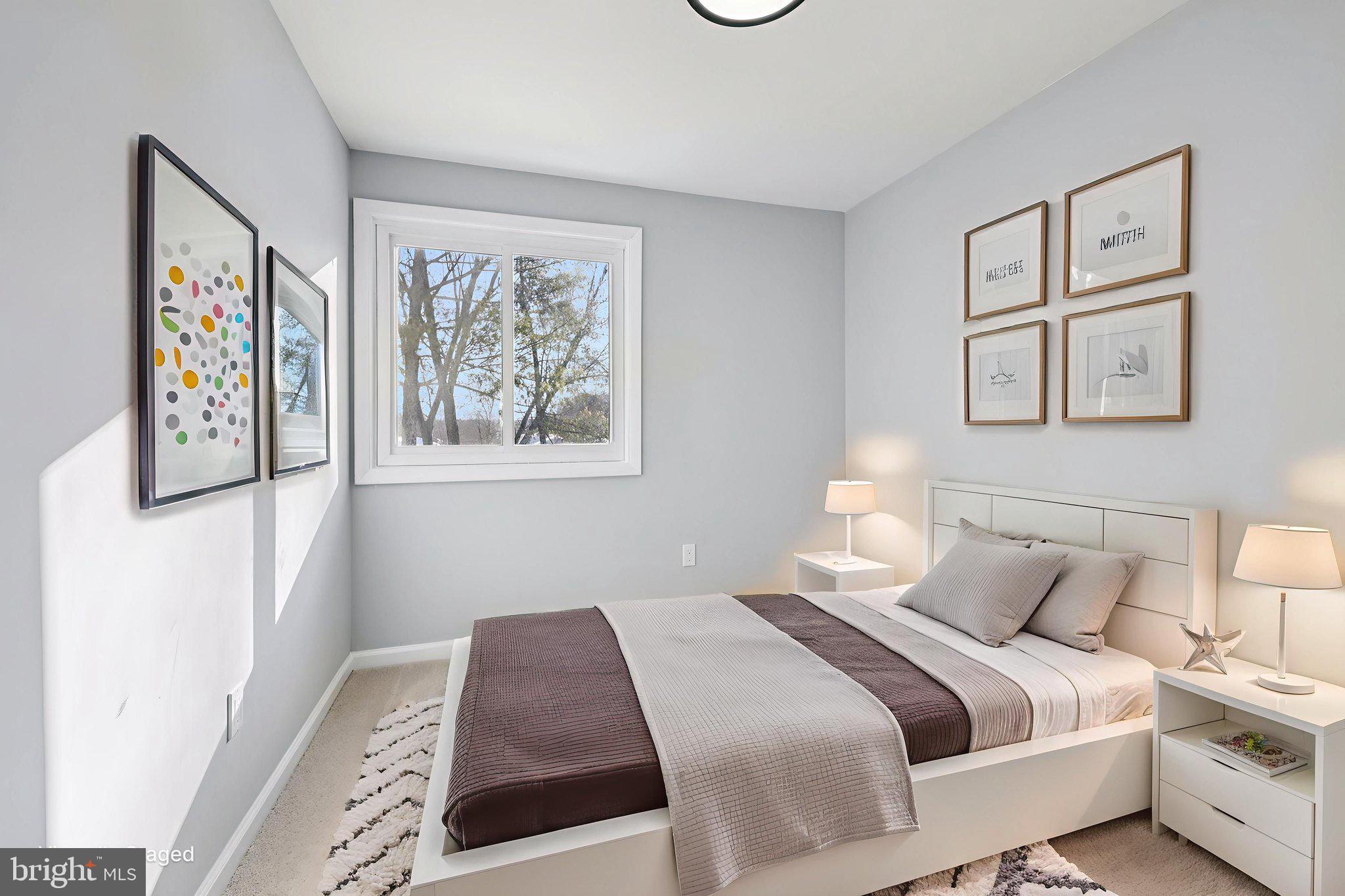 500 Giles Place Sterling, VA 20164 - Photo 31 of 41 a bedroom with a large bed and a window