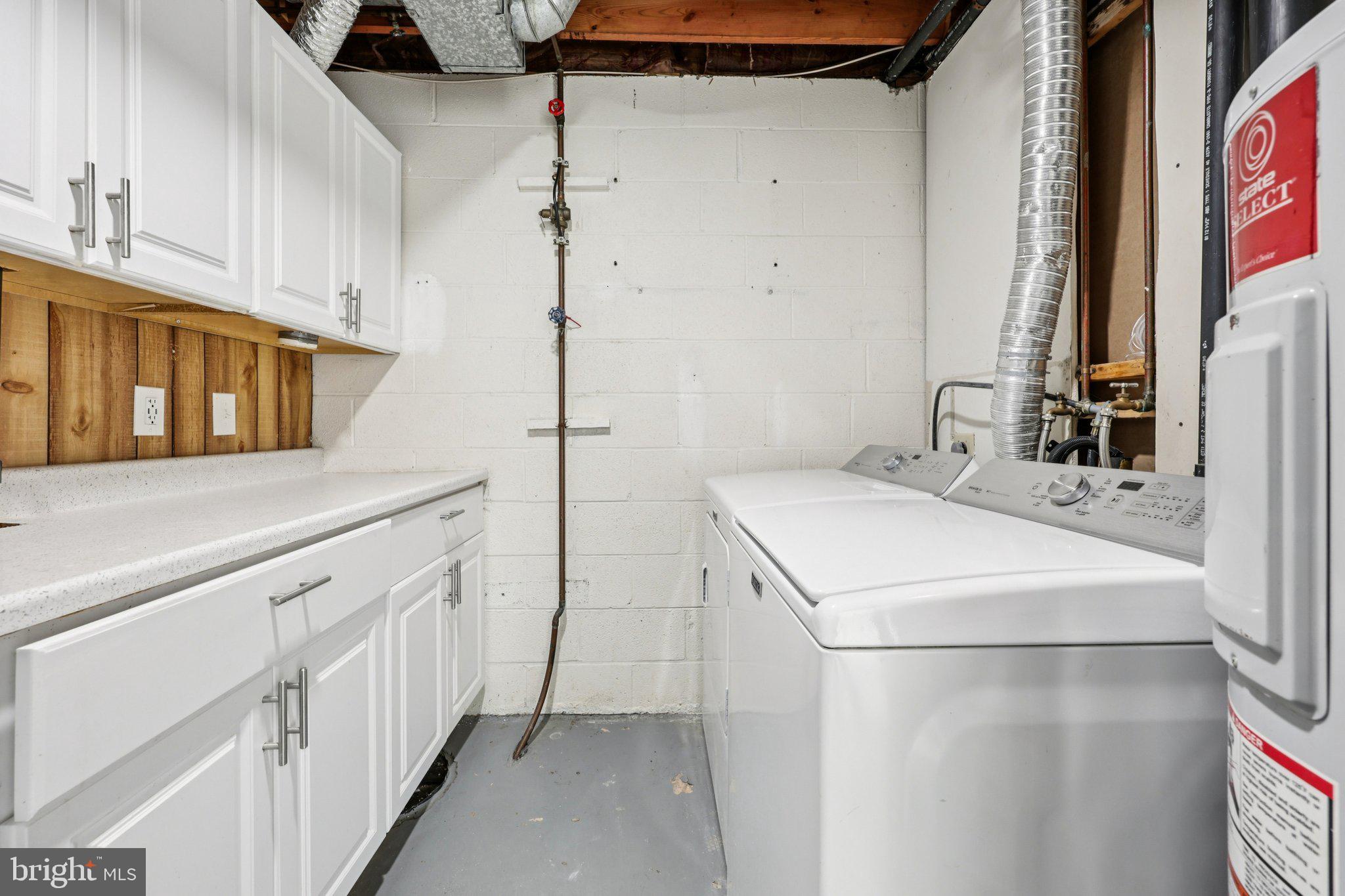 500 Giles Place Sterling, VA 20164 - Photo 39 of 41 a utility room with dryer and washer