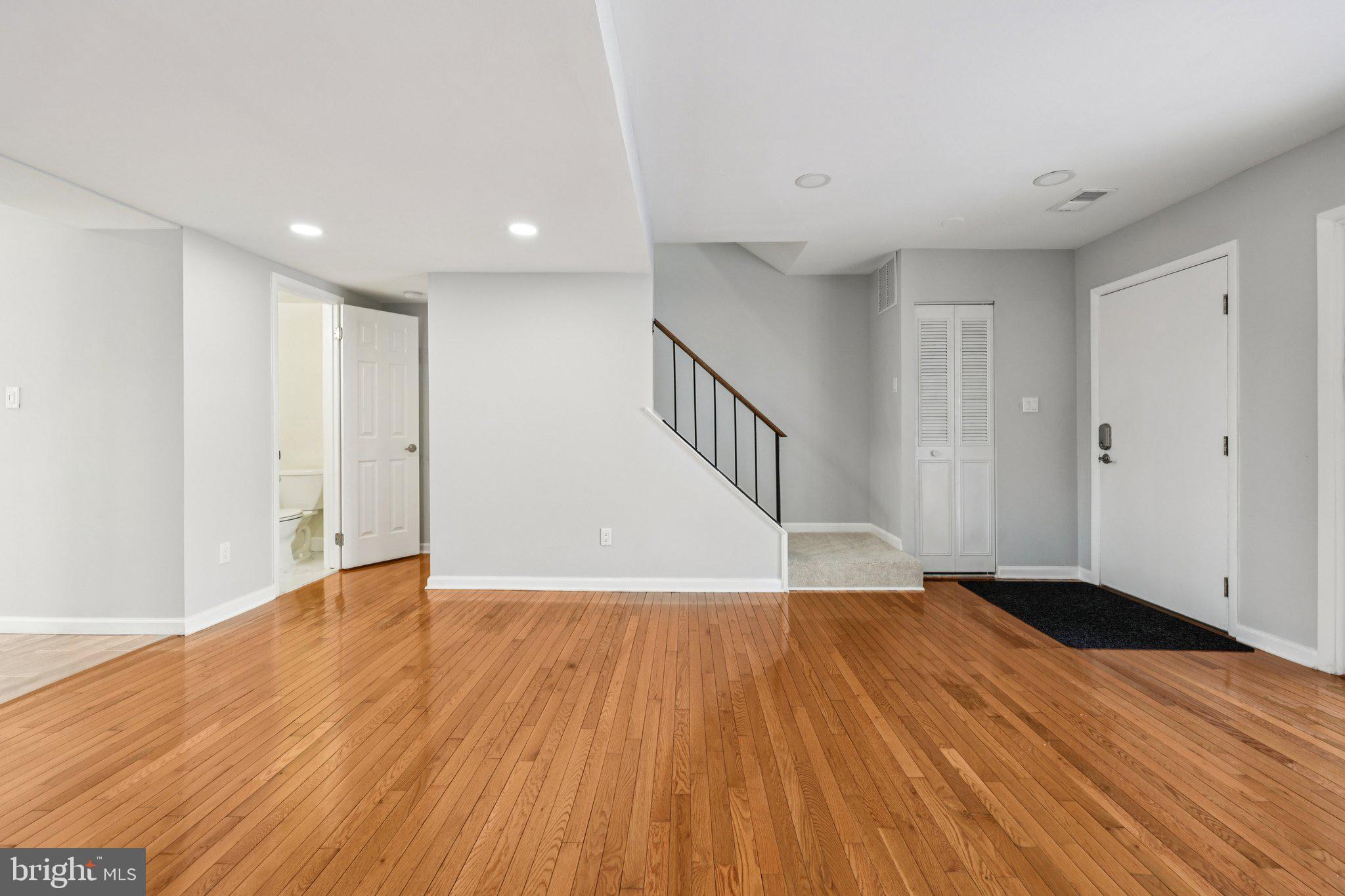 500 Giles Place Sterling, VA 20164 - Photo 6 of 41 a view of an empty room with wooden floor