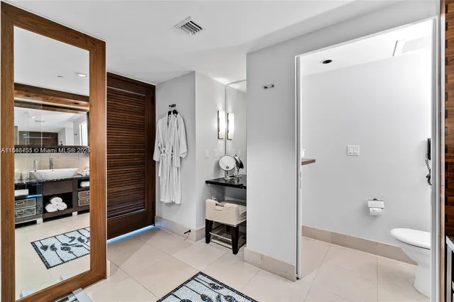 a view of an entryway with furniture and shower