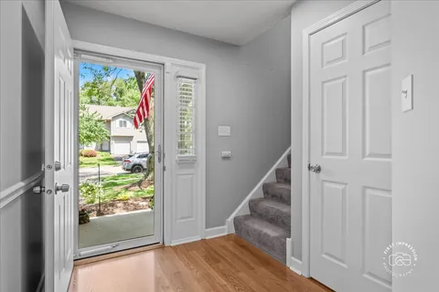 a view of front door and deck