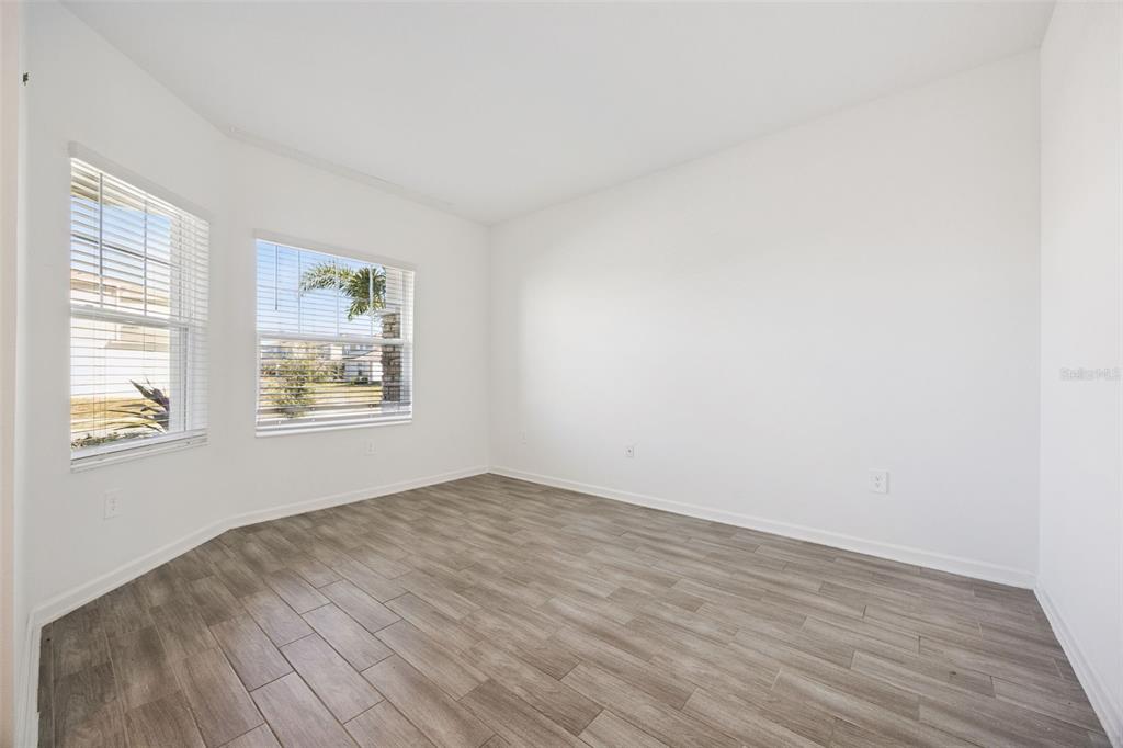 6298 Lakepine Street St. Cloud, FL 34771 - Photo 28 of 41 an empty room with windows