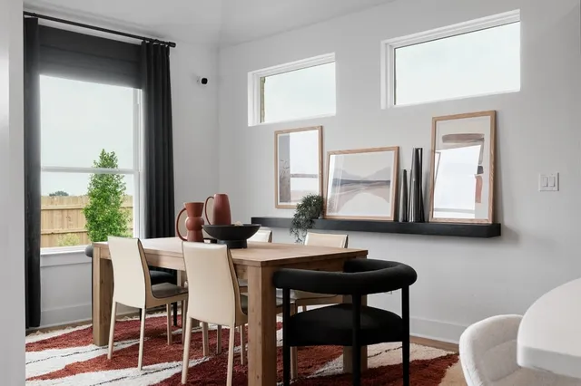 a kitchen with sink a stove and cabinets