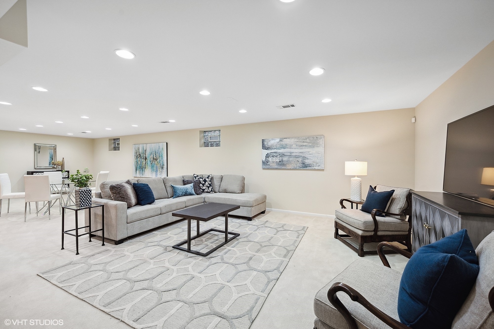 895 Tower Road Winnetka, IL 60093 - Photo 45 of 57 a living room with furniture and a flat screen tv
