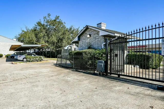 a view of street with parked cars