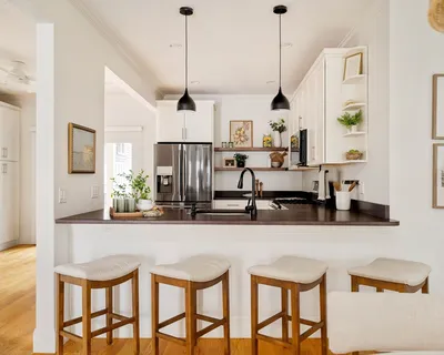 a view of living room with furniture and window