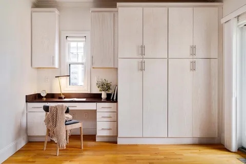 a view of a kitchen with chair and table