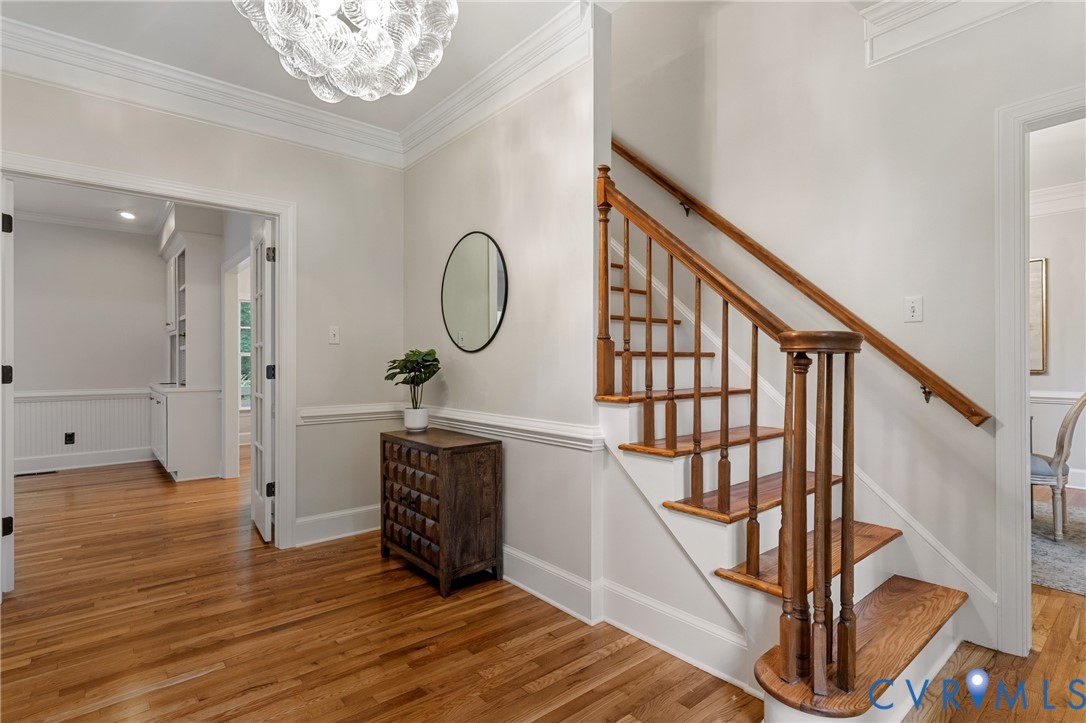 2319 Chartstone Drive Midlothian, VA 23113 - Photo 5 of 50 Foyer with oak hardwood floors and chandelier