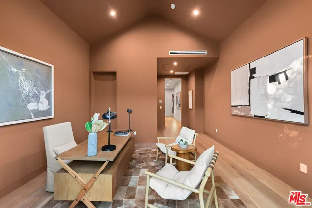 a workspace with furniture and a window