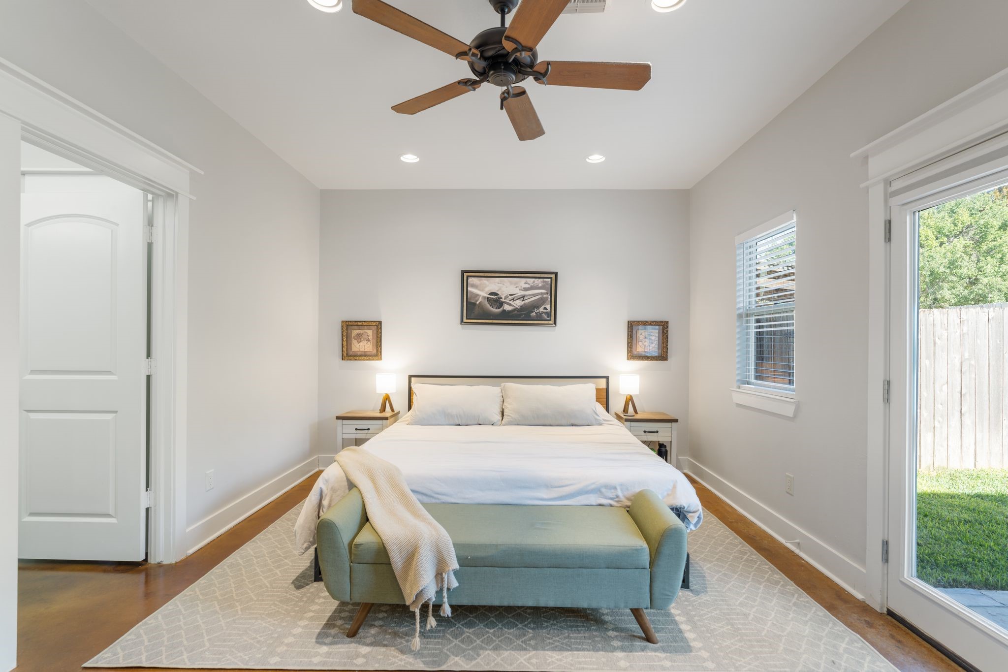 1408 Asbury Street Houston, TX 77007 - Photo 4 of 24 a bedroom with a bed and a window