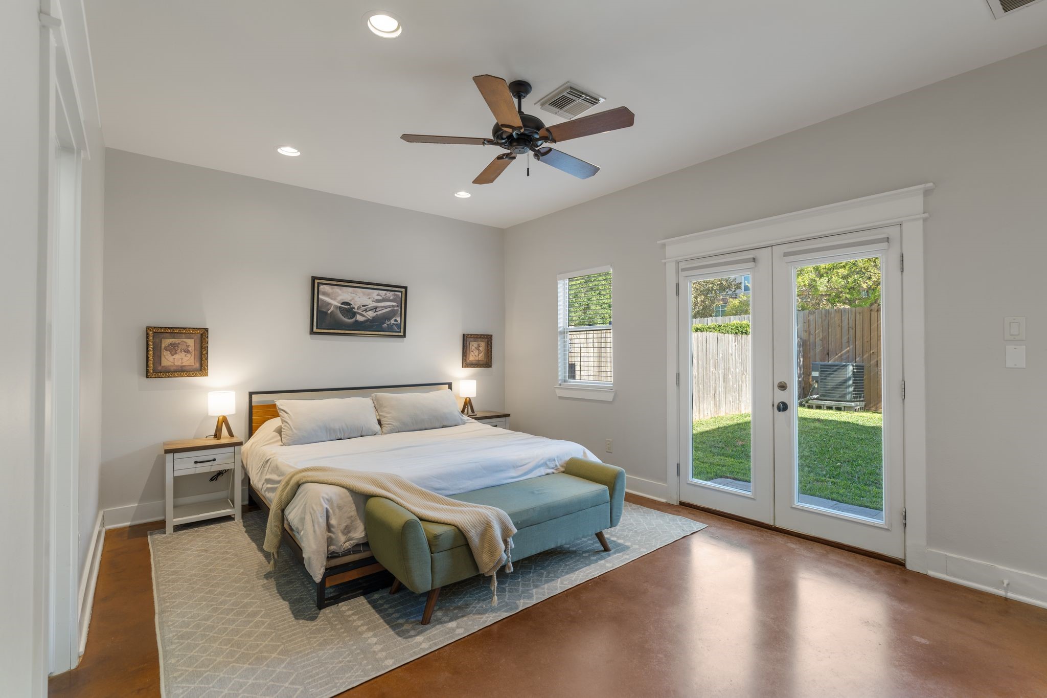 1408 Asbury Street Houston, TX 77007 - Photo 5 of 24 a bedroom with a bed and a large window