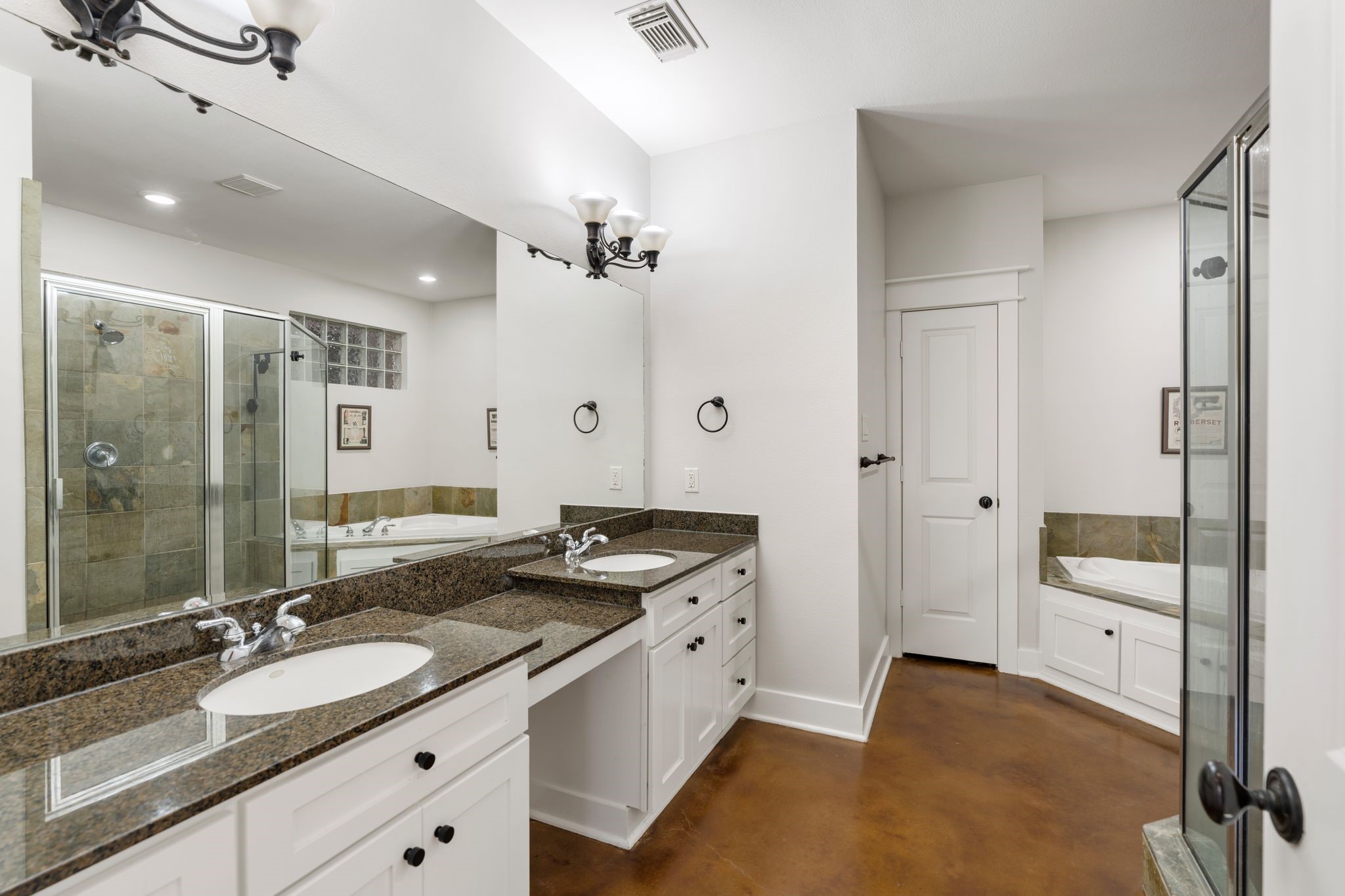 1408 Asbury Street Houston, TX 77007 - Photo 7 of 24 a spacious bathroom with a granite countertop sink mirror and double