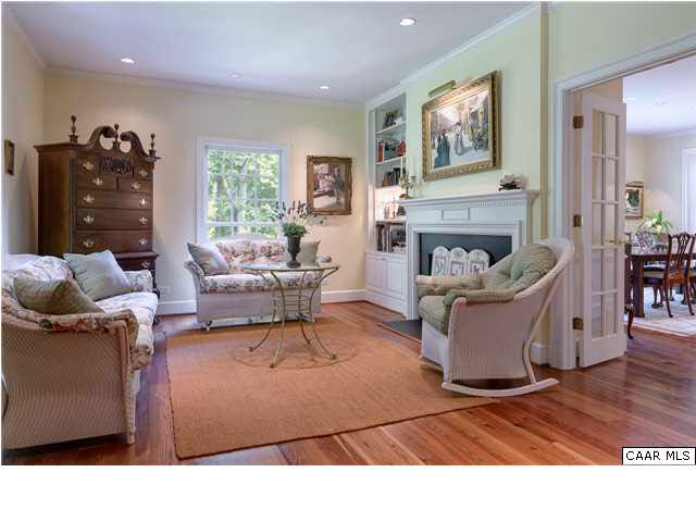 871 Tanglewood Road Charlottesville, VA 22901 - Photo 4 of 33 a living room with furniture and fireplace