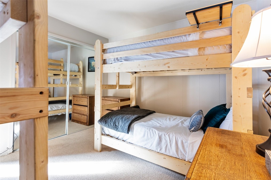 433 Wild Irishman Road, Unit 12101 Keystone, CO 80435 - Photo 10 of 20 a bedroom with a bed and a window