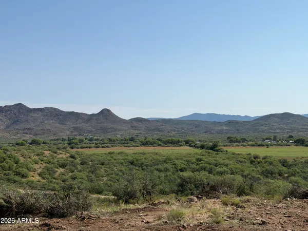 a view of a mountain with a outdoor space