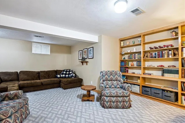 a living room with furniture and a couch