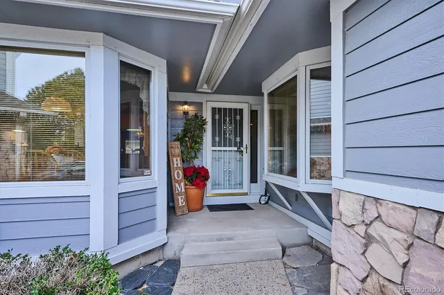 a view of a porch with a bench