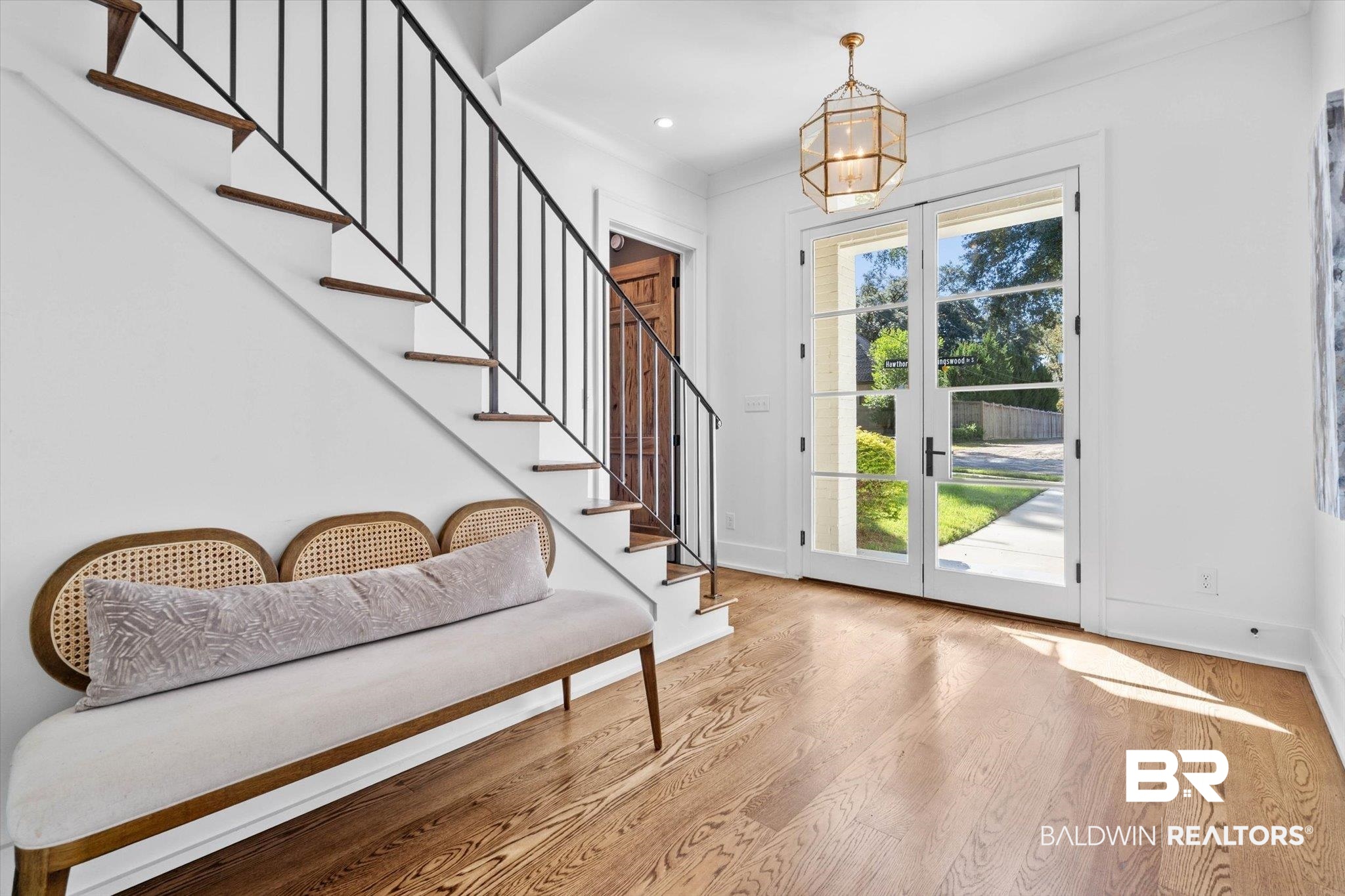 4602 Kingswood Drive Mobile, AL 36608 - Photo 3 of 45 Entryway featuring wood finished floors, stairway, recessed lighting, a chandelier, and ornamental molding