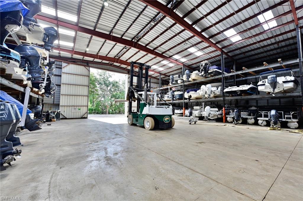 5025 Bonita Beach Road Southwest Bonita Springs, FL 34134 - Photo 11 of 23 a view of parking garage with lots of furniture