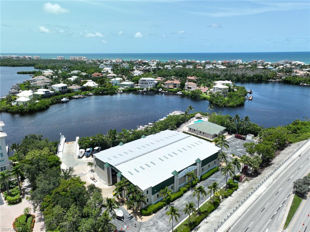 5025 Bonita Beach Road Southwest Bonita Springs, FL 34134 - Photo 13 of 23 an aerial view of a house with a lake view