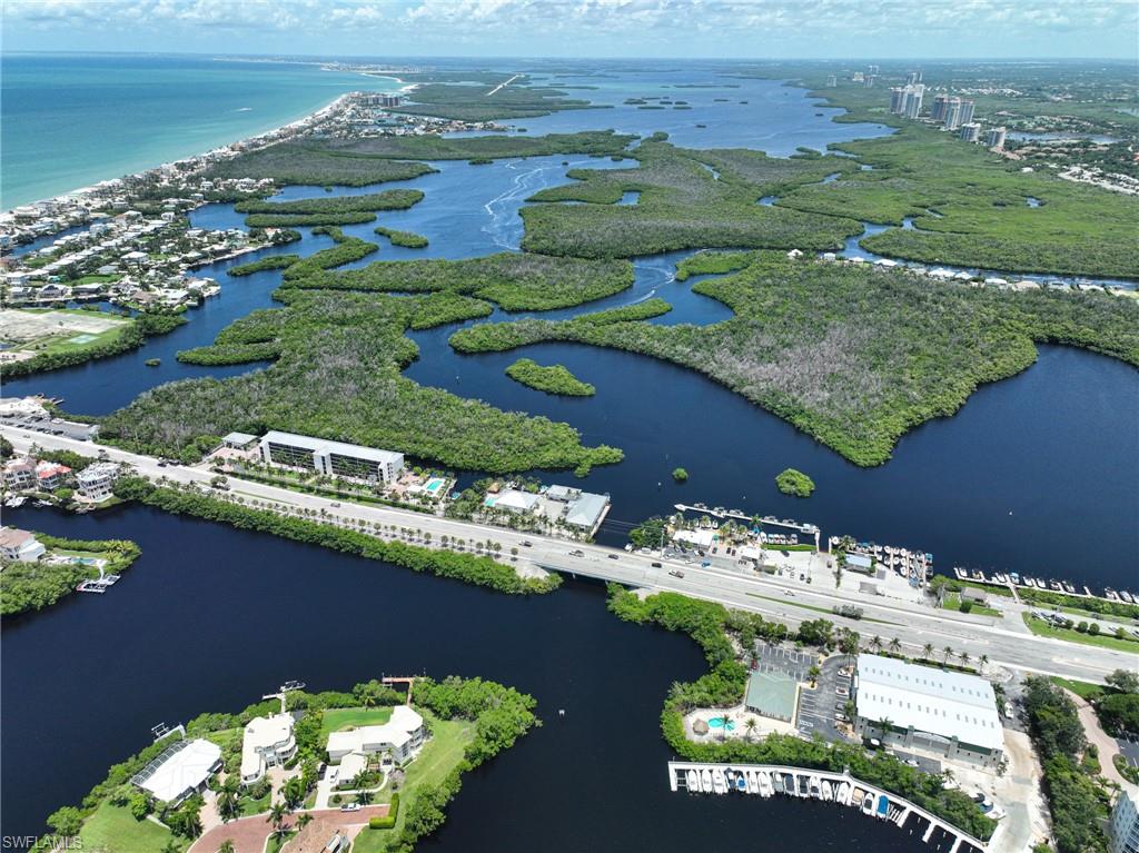 5025 Bonita Beach Road Southwest Bonita Springs, FL 34134 - Photo 17 of 23 a view of a lake with a mountain