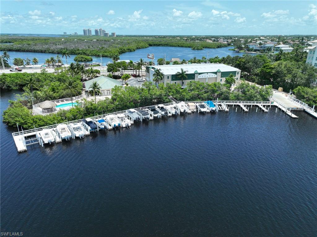 5025 Bonita Beach Road Southwest Bonita Springs, FL 34134 - Photo 19 of 23 an aerial view of a city with lots of residential buildings ocean and mountain view in back