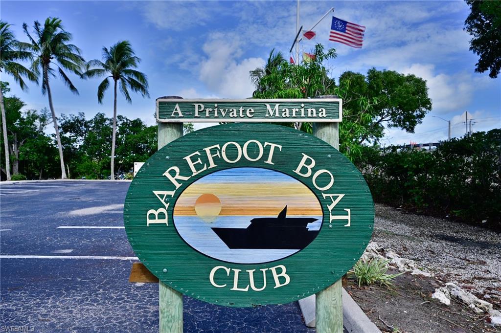 5025 Bonita Beach Road Southwest Bonita Springs, FL 34134 - Photo 23 of 23 a sign that is sitting on the side of the road