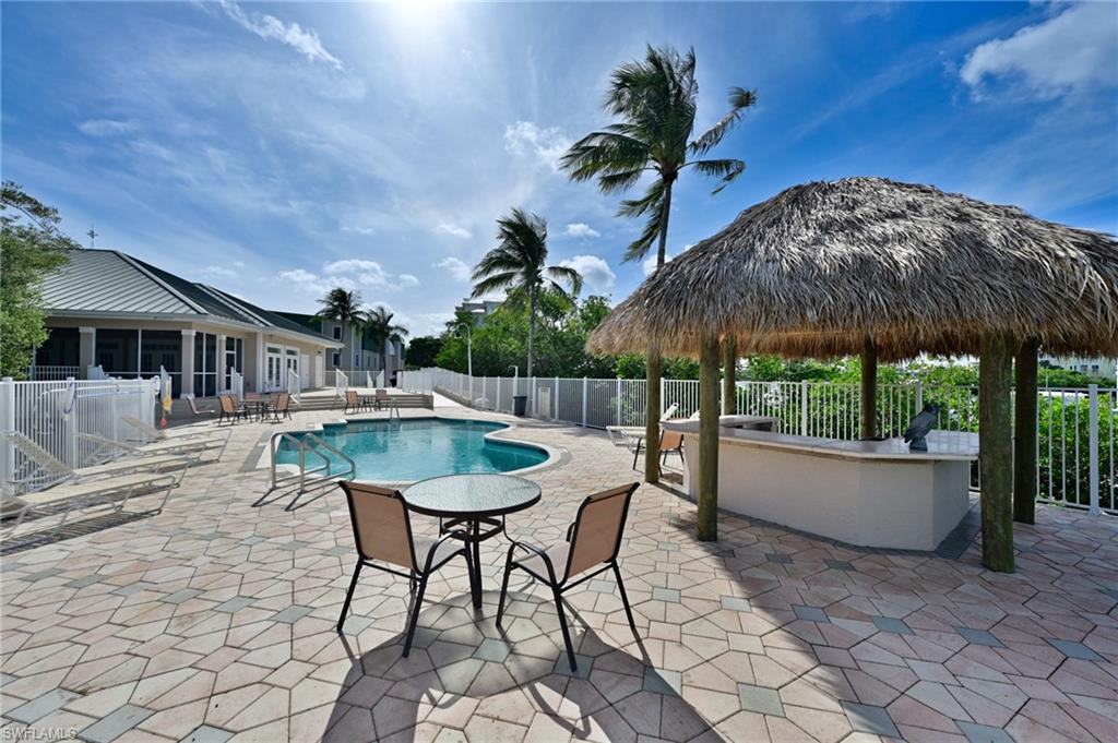5025 Bonita Beach Road Southwest Bonita Springs, FL 34134 - Photo 7 of 23 a view of a house with backyard and sitting area