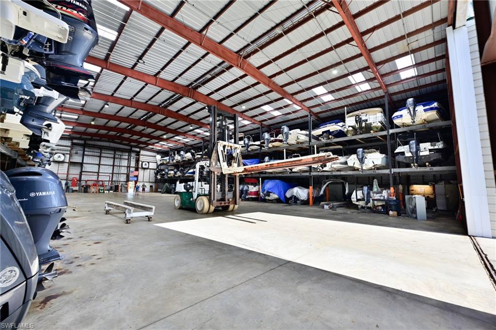 5025 Bonita Beach Road Southwest Bonita Springs, FL 34134 - Photo 10 of 23 a view of a garage with storage