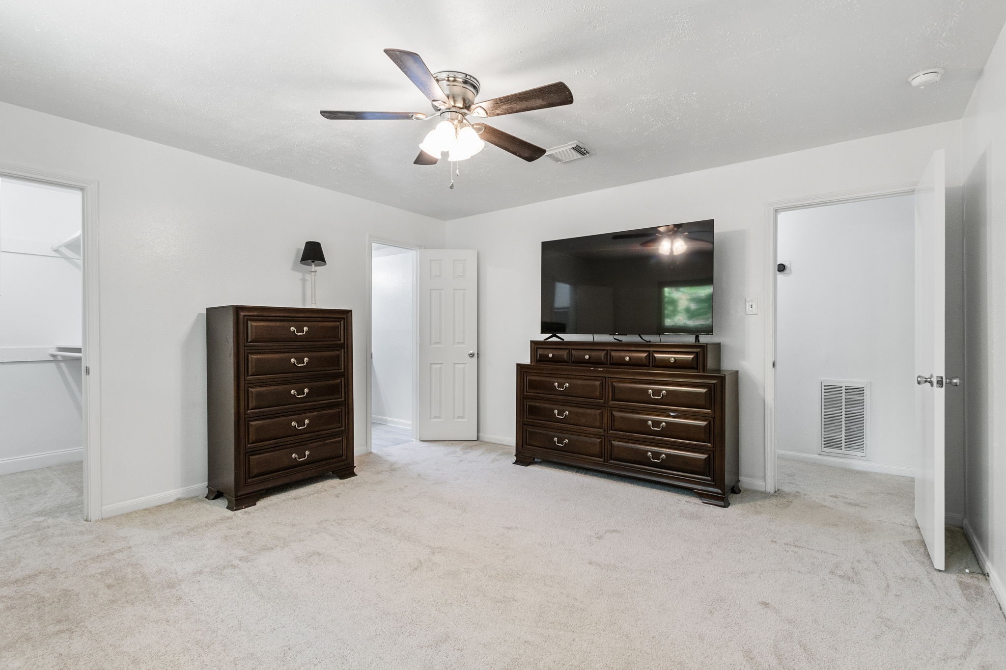 9726 John Bank Drive Spring, TX 77379 - Photo 21 of 36 Primary Suite