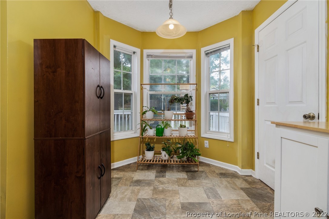 1070 Roundabout Road Cameron, NC 28326 - Photo 12 of 34 a view of kitchen with furniture and large window